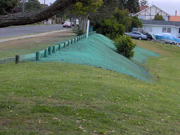 close up of the re-profiling and hydromulching of the sports field bank
