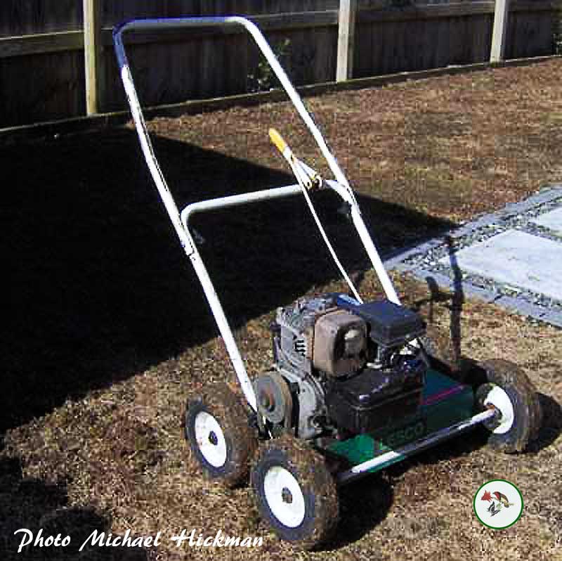 verticutter renovating lawn